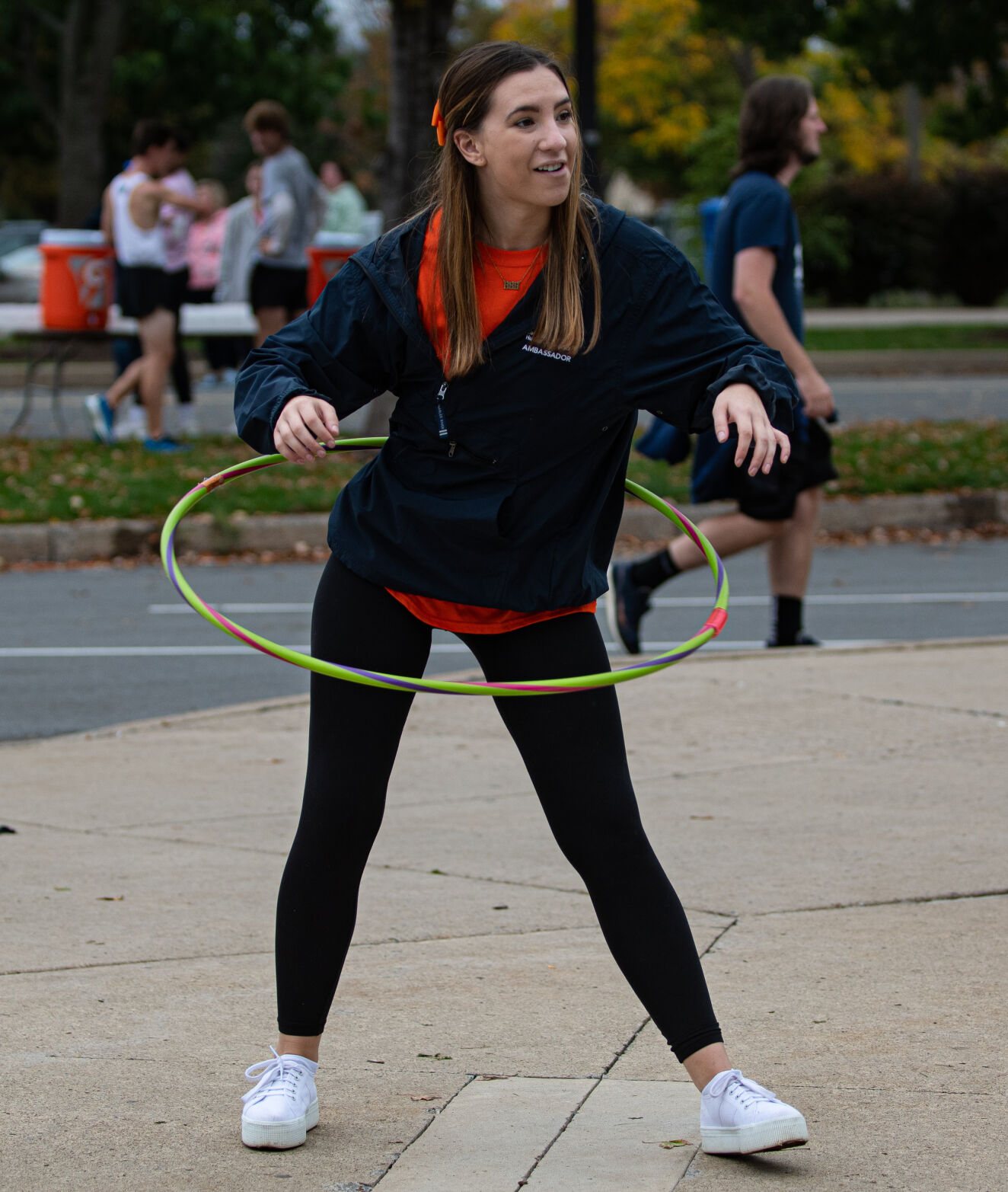 Rachel Walker hula hoops at THON 5K
